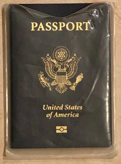 a black passport with gold text