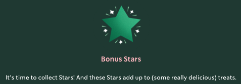 a green star with pink text