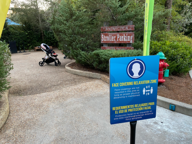 a sign in front of a stroller