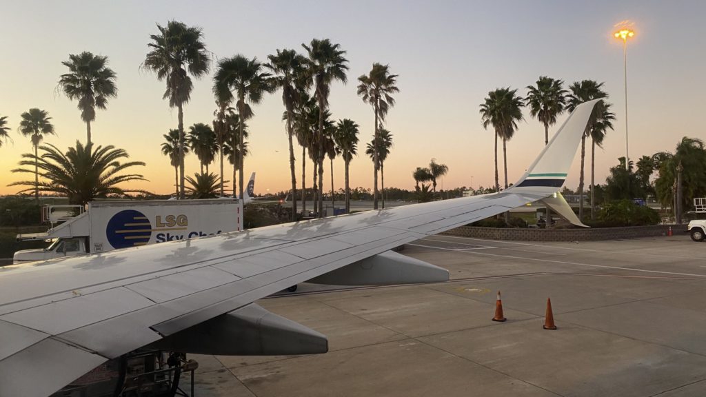 an airplane wing on a runway