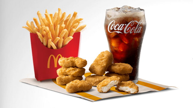 chicken nuggets and french fries with a drink