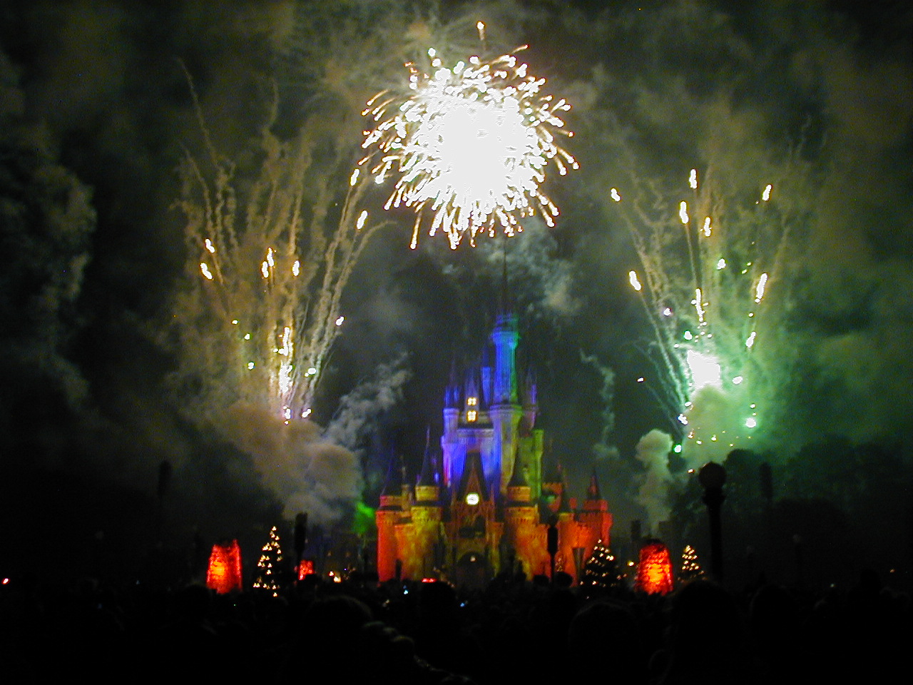 fireworks in the sky above a castle