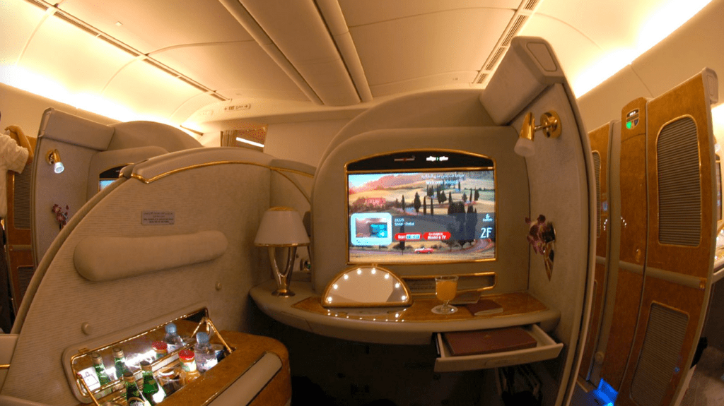 a tv on a table in an airplane