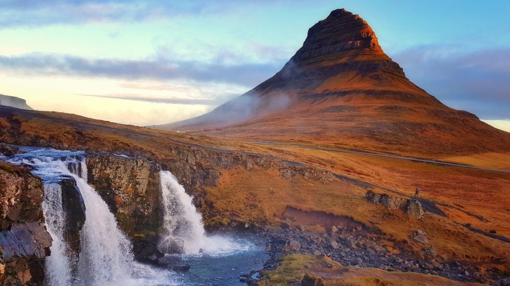 a waterfall in a mountain