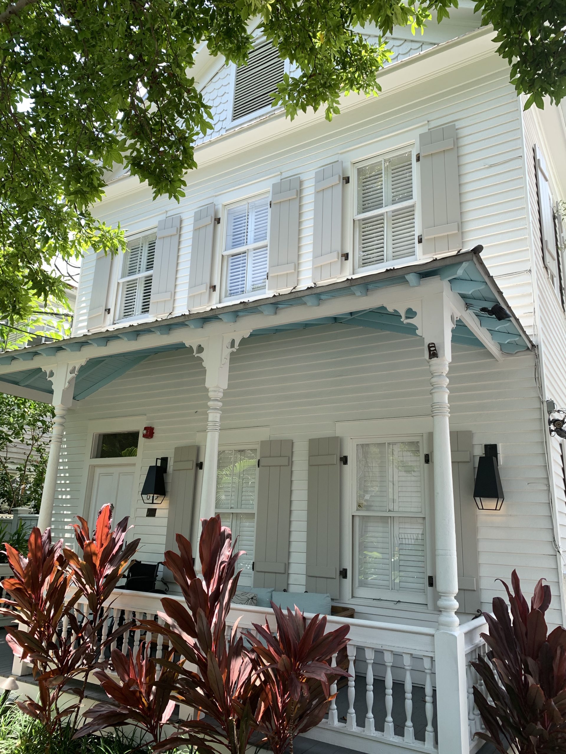 a white house with blue trim