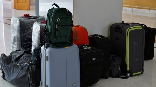 a group of luggage on a floor