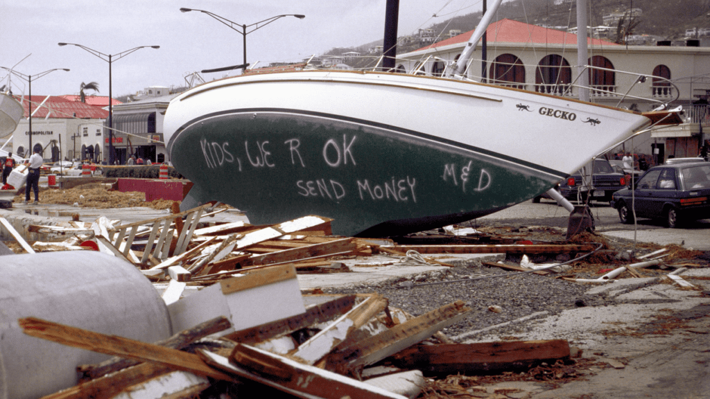 a boat on the ground with debris