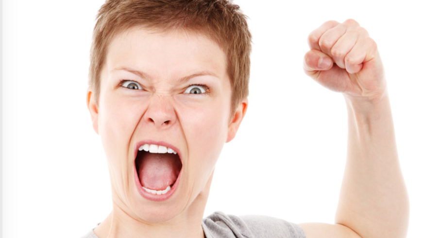 a woman with short hair yelling