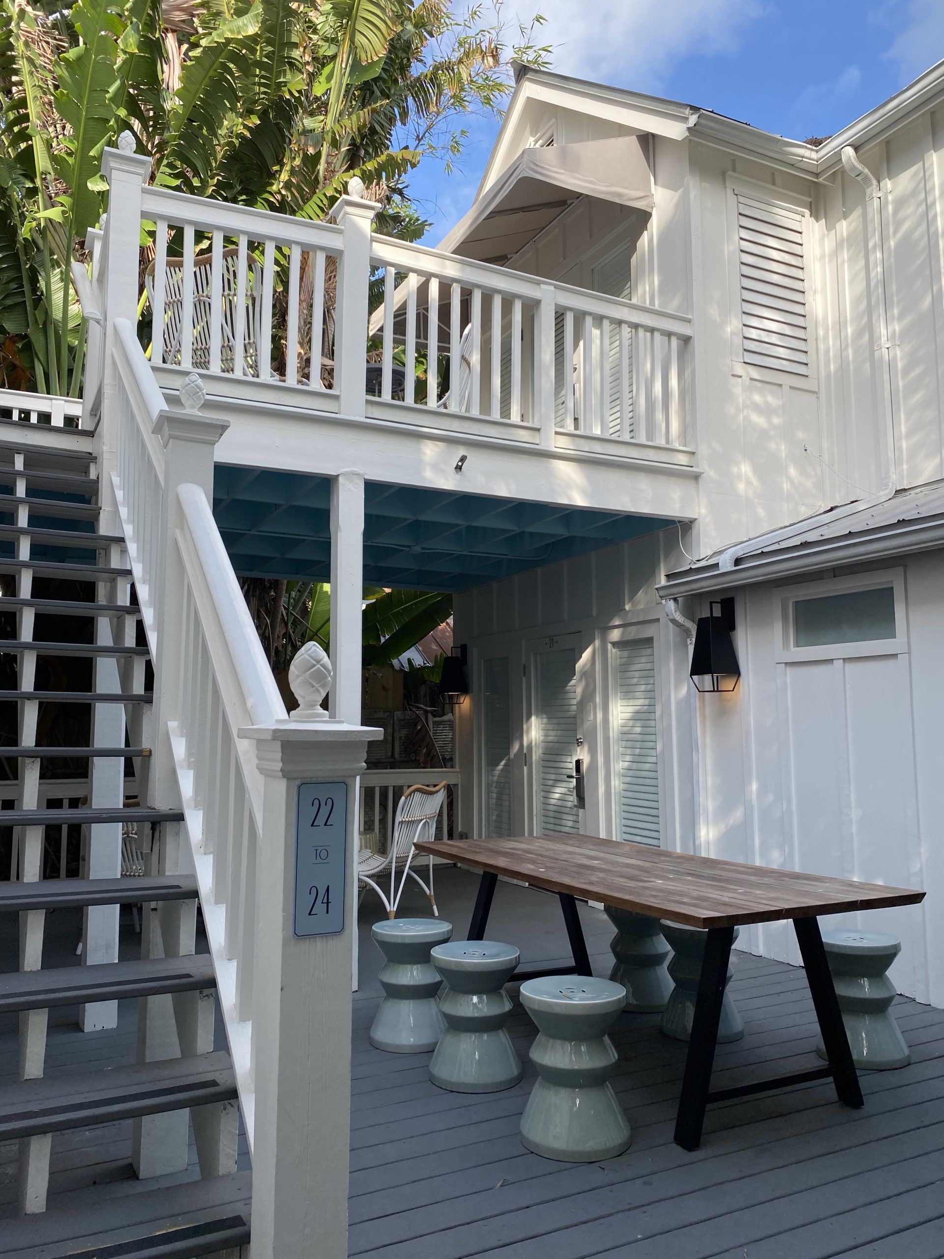 a white house with a table and chairs