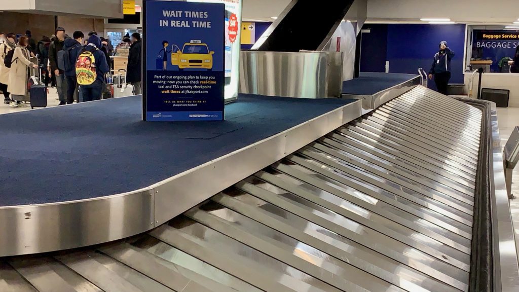 a sign on a conveyor belt