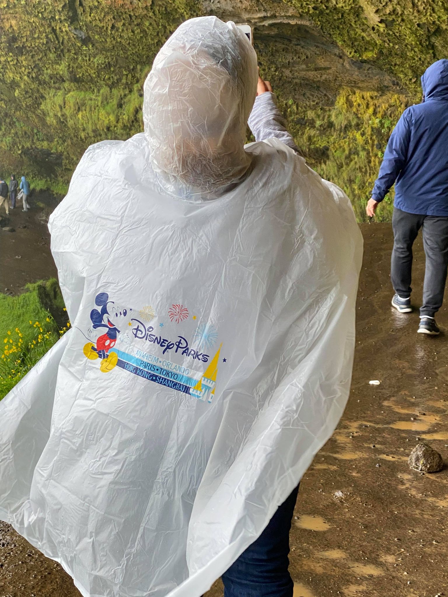 a person wearing a plastic poncho