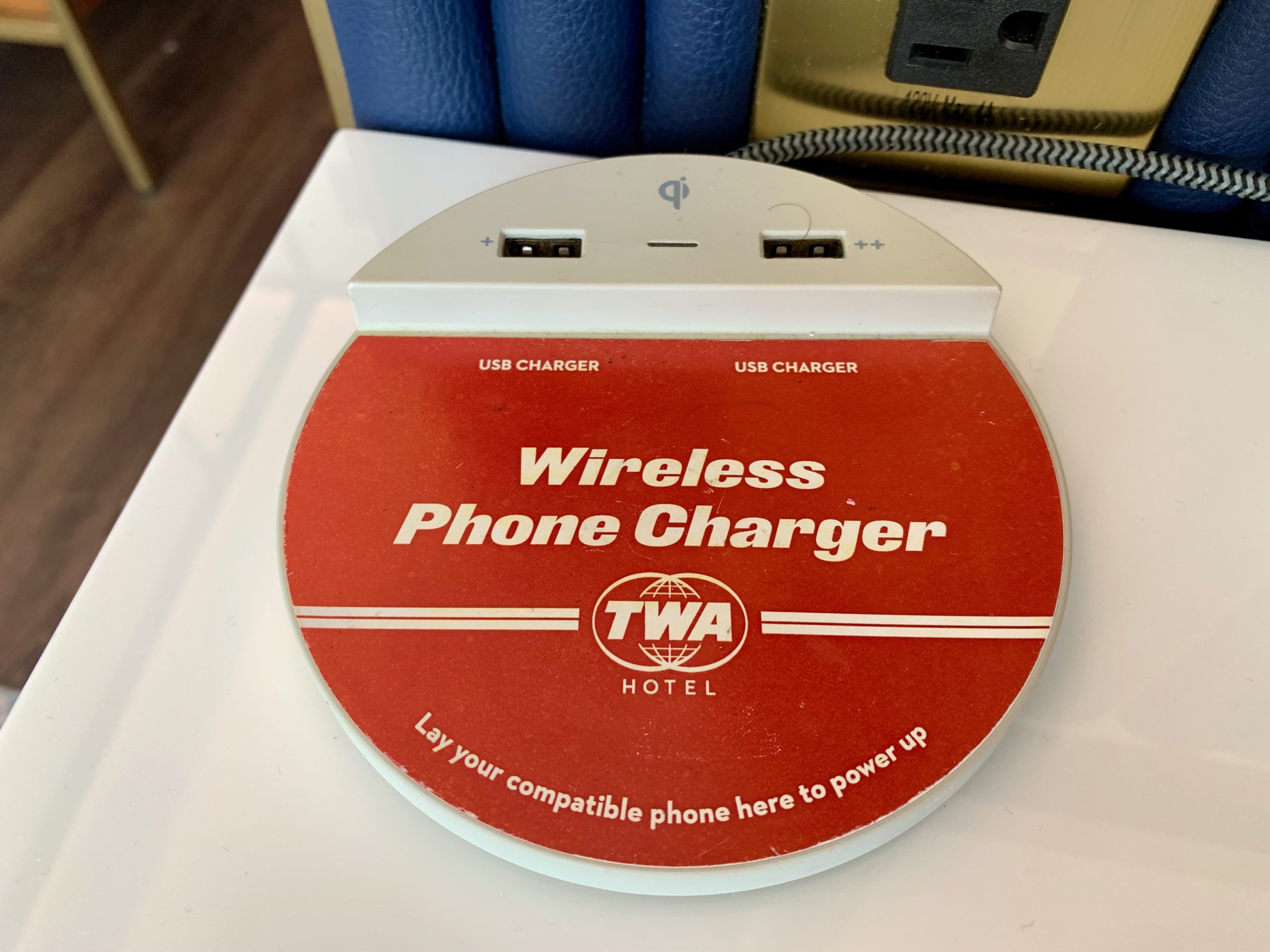 a red and white wireless charger