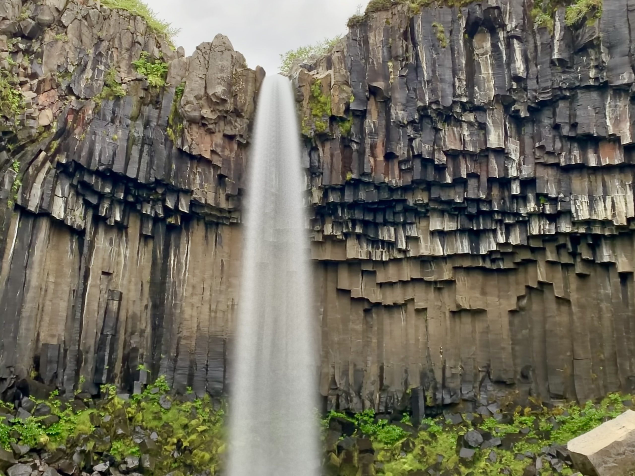 a waterfall in a rocky area