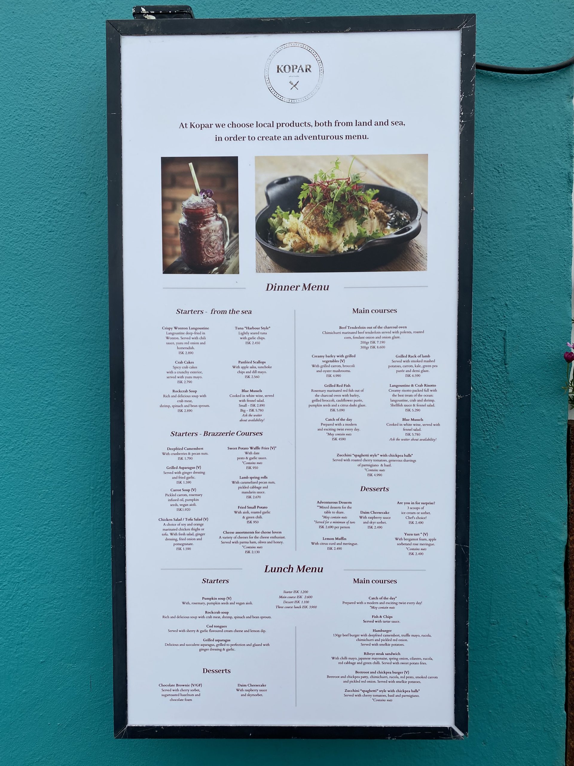 a menu board with a picture of food and a jar on it