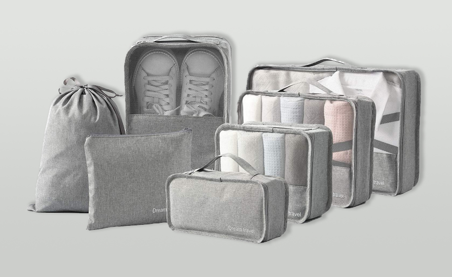 a group of grey bags with white shoes inside