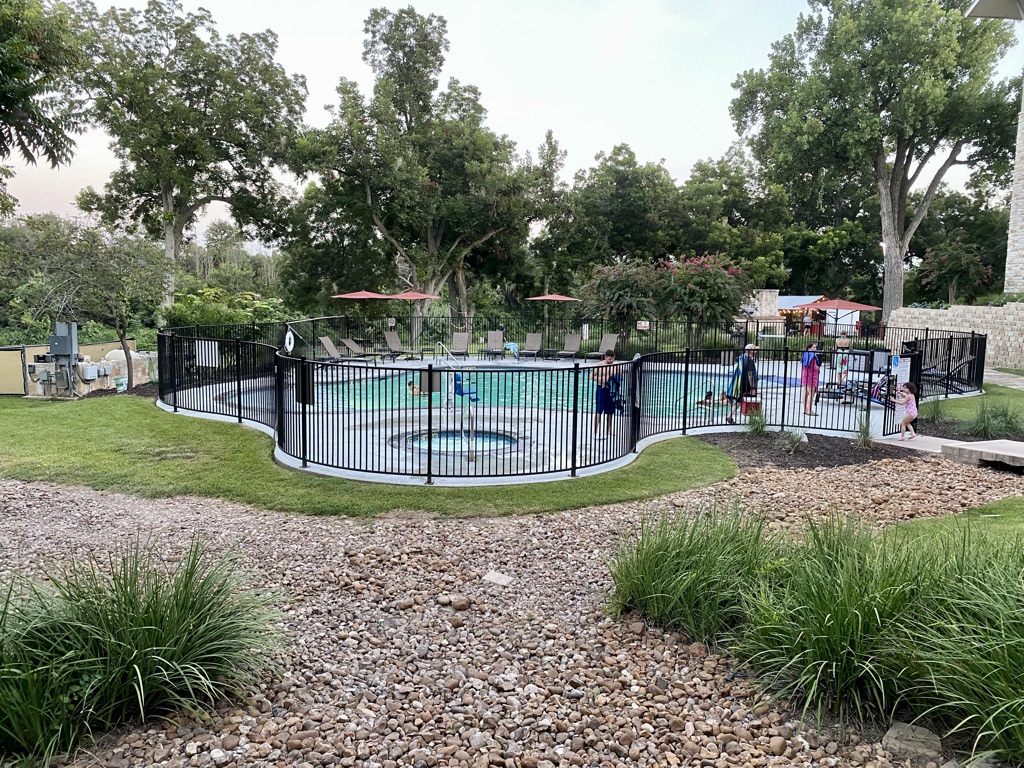 a pool with a fence around it