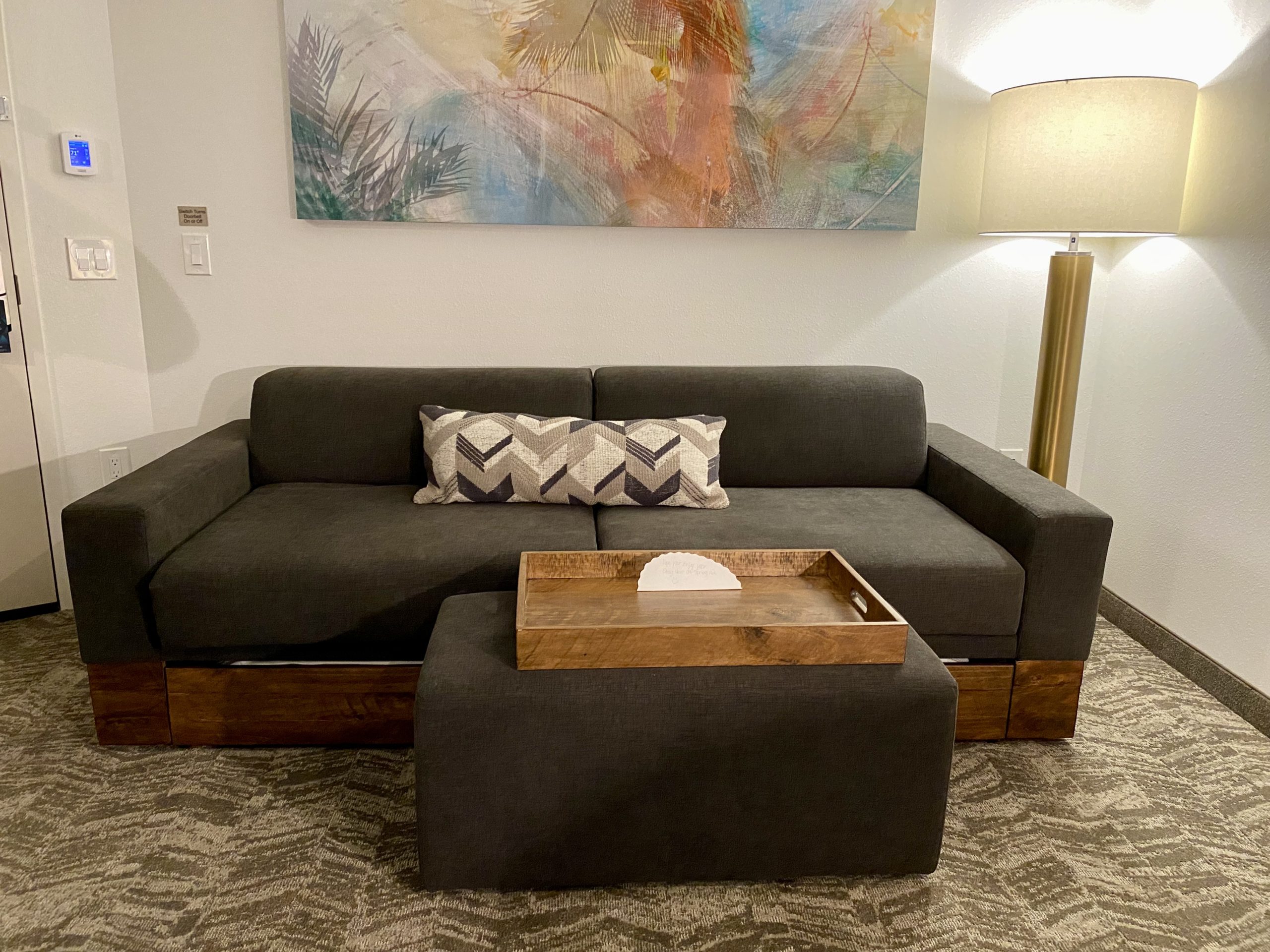 a couch with a coffee table in a room