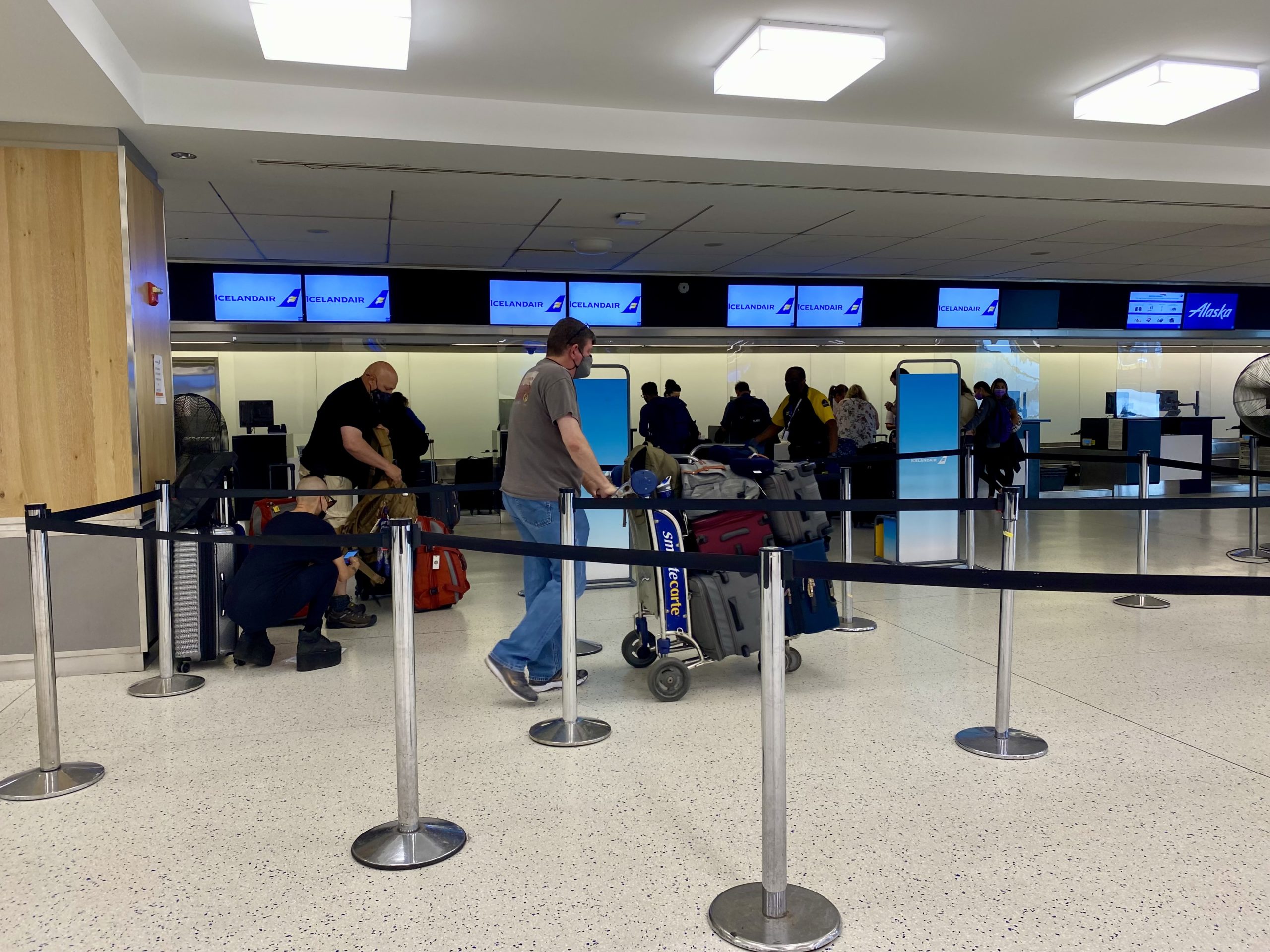 people walking in an airport