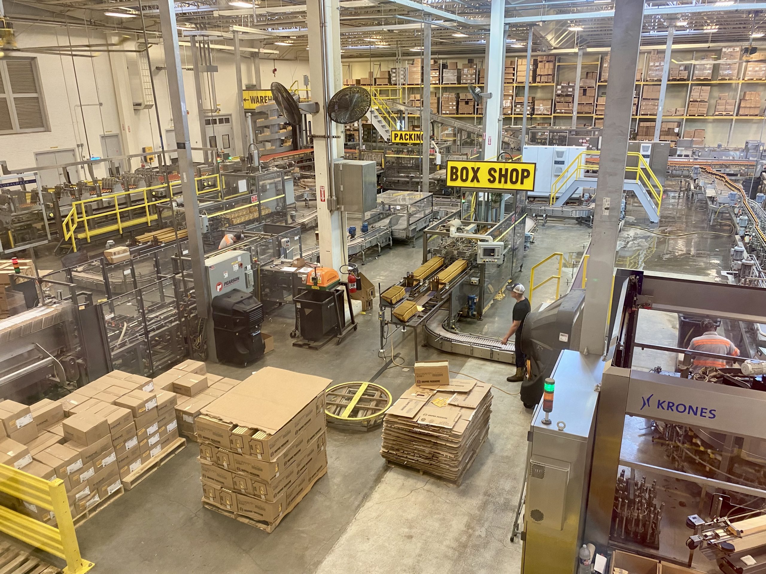 a factory with boxes and machines