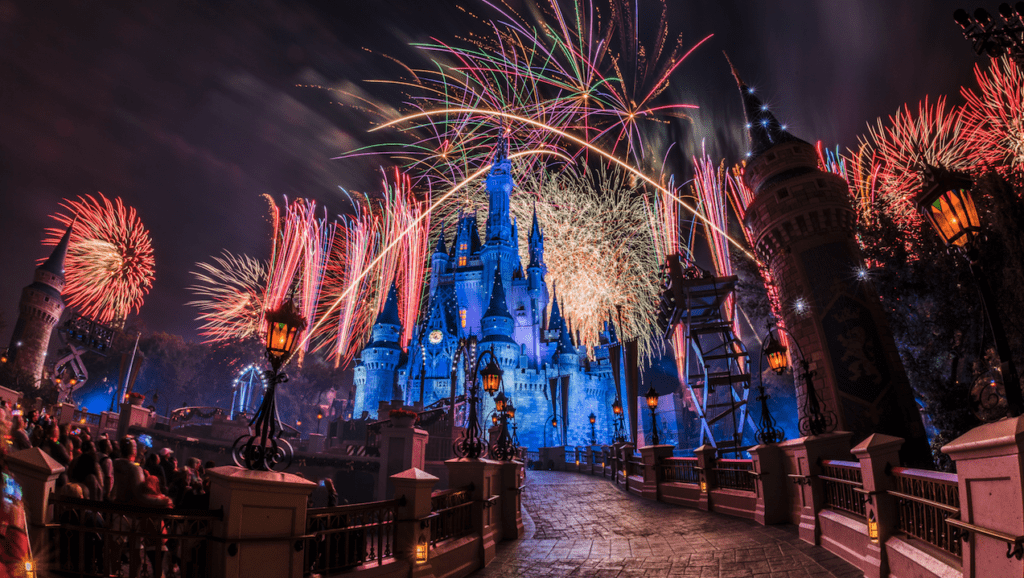 fireworks in the sky over a castle