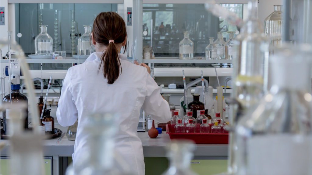 a woman in a lab coat