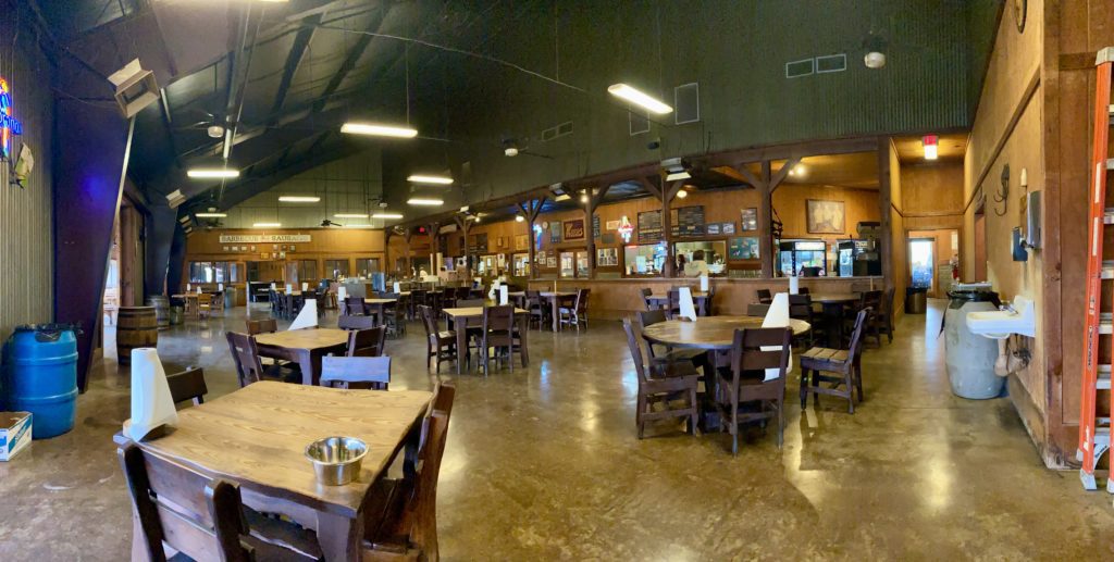 a large room with tables and chairs