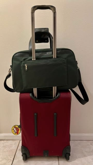 a stack of luggage on a swinger