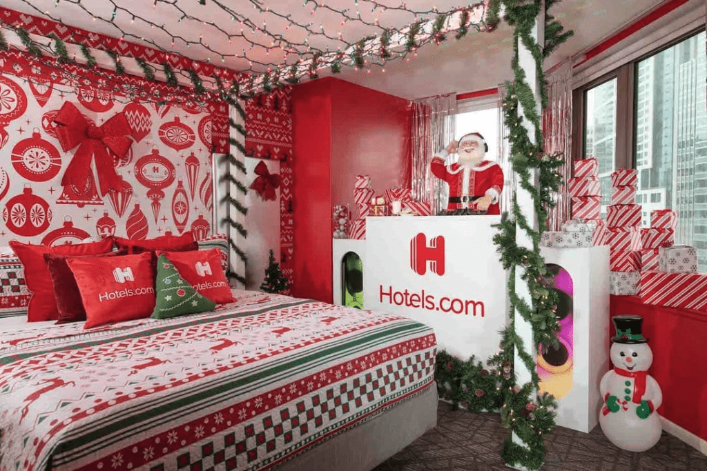 a room with a bed and a christmas decoration