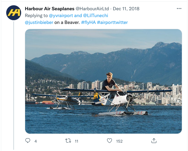 a man sitting on a small plane in water