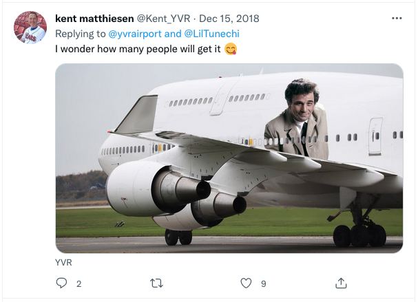 a white airplane with a man's face on the side
