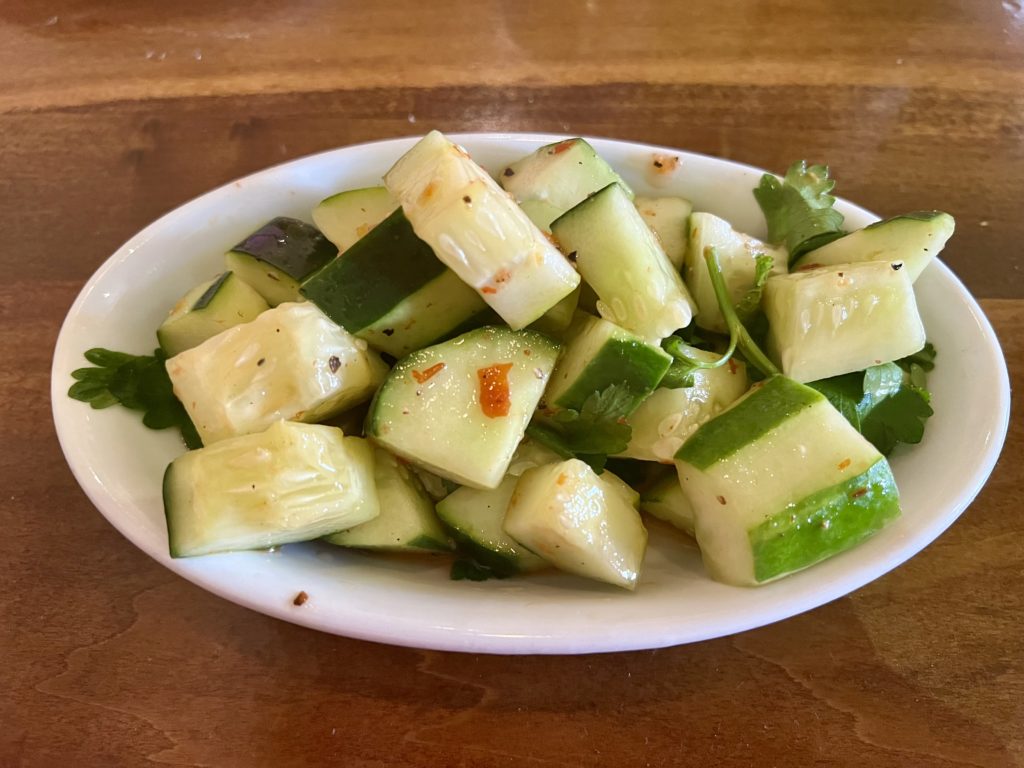 a plate of cucumber salad