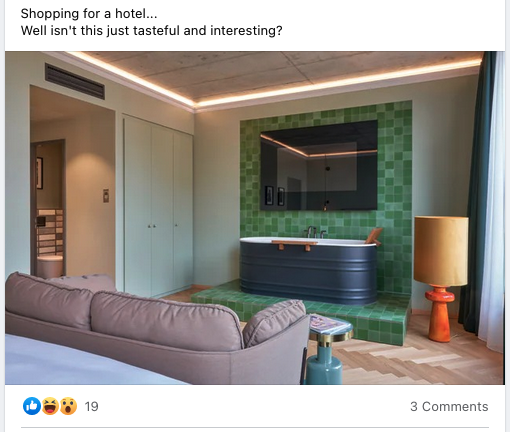 a room with a tub and a sofa