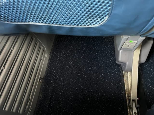 a black carpet in an airplane