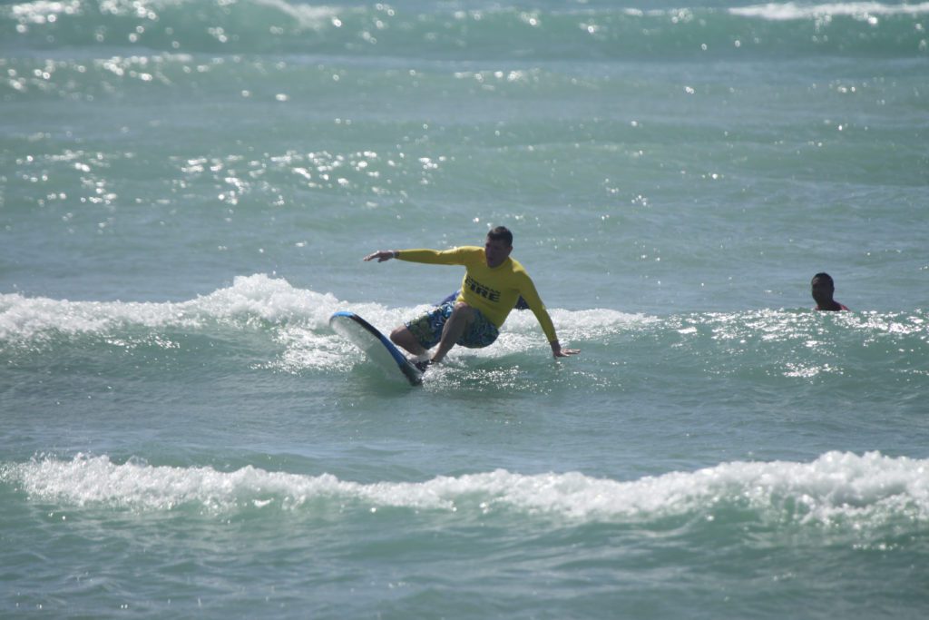 a man surfing in the ocean