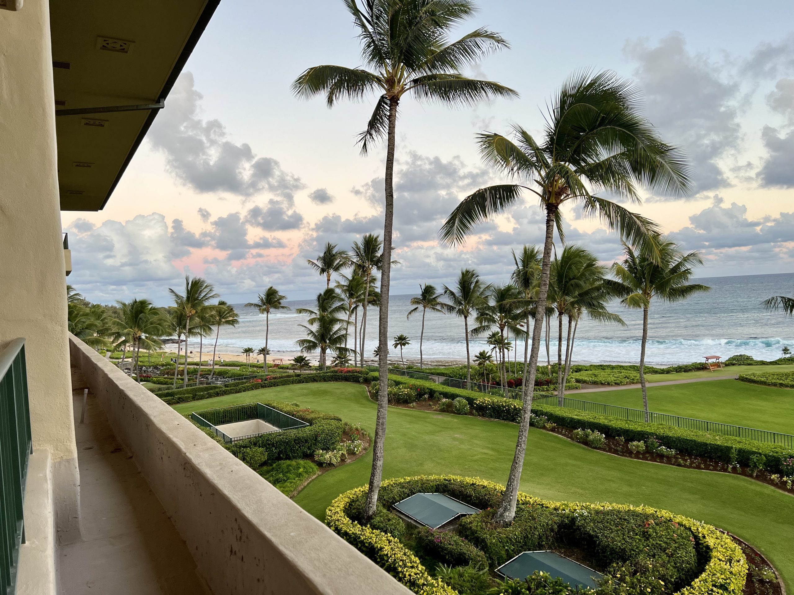 a view of a beach from a balcony