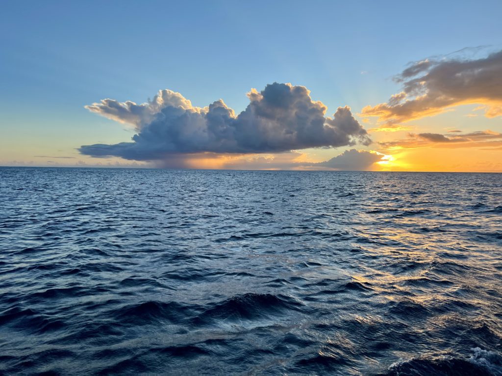 a sunset over the ocean