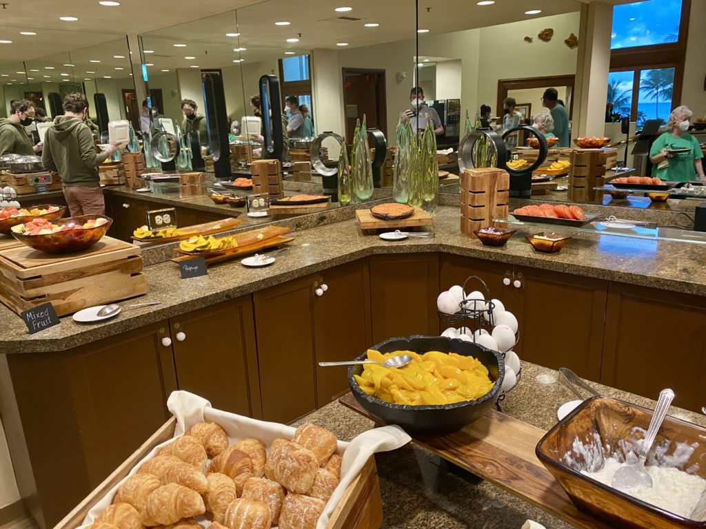 a buffet room with food on the counter