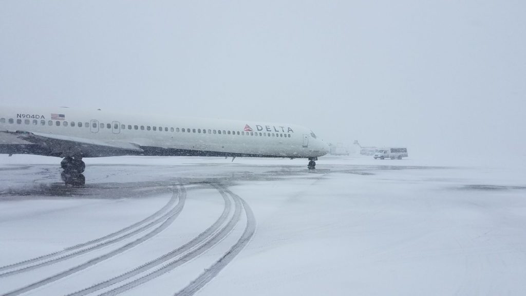 a plane on a snowy runway