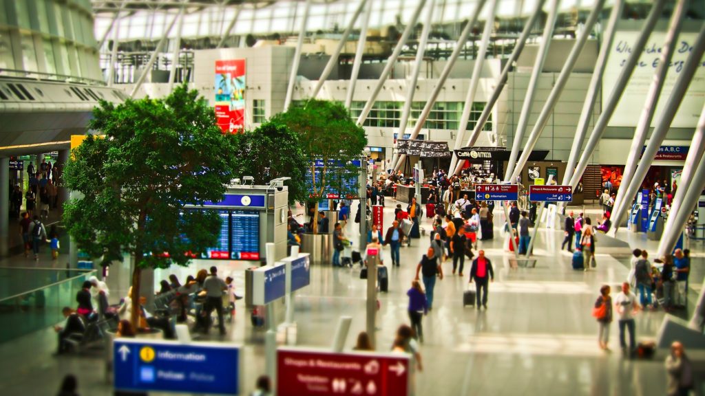 a group of people in a terminal