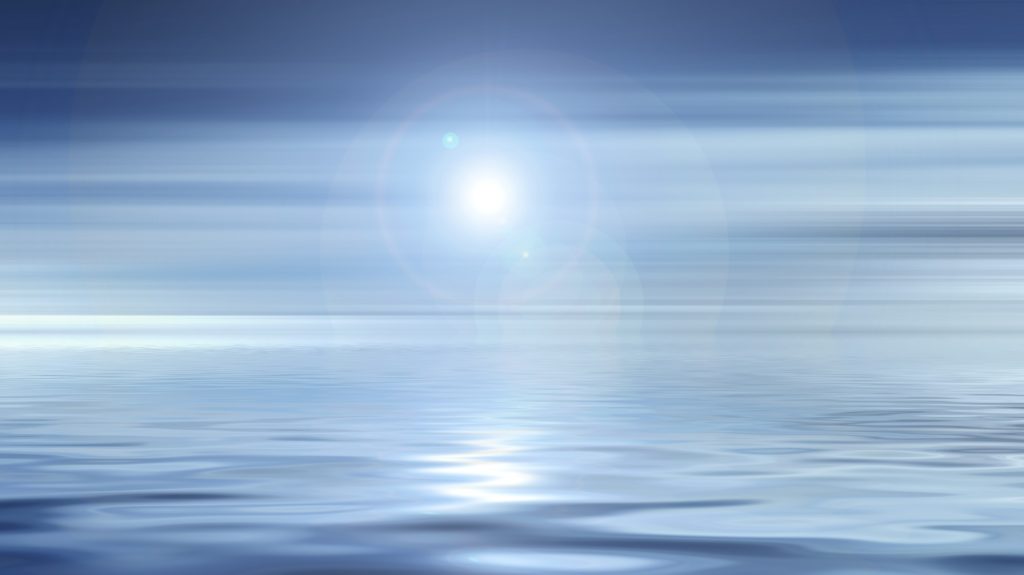 a bright light over water