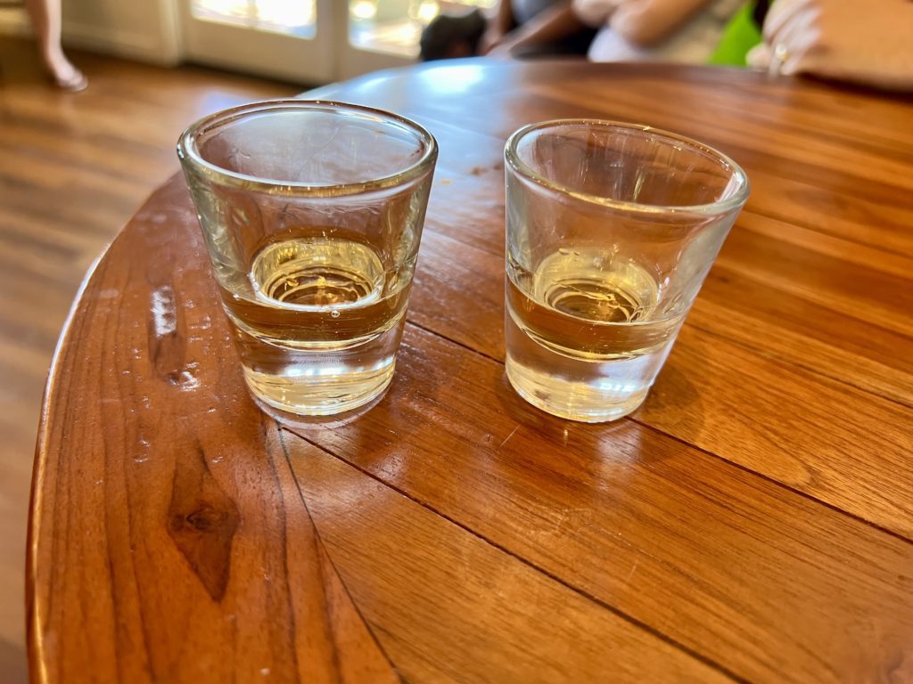 two shot glasses on a table