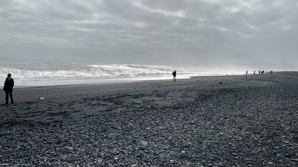 a person walking on a beach