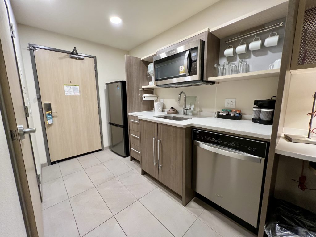 a kitchen with a microwave oven and refrigerator