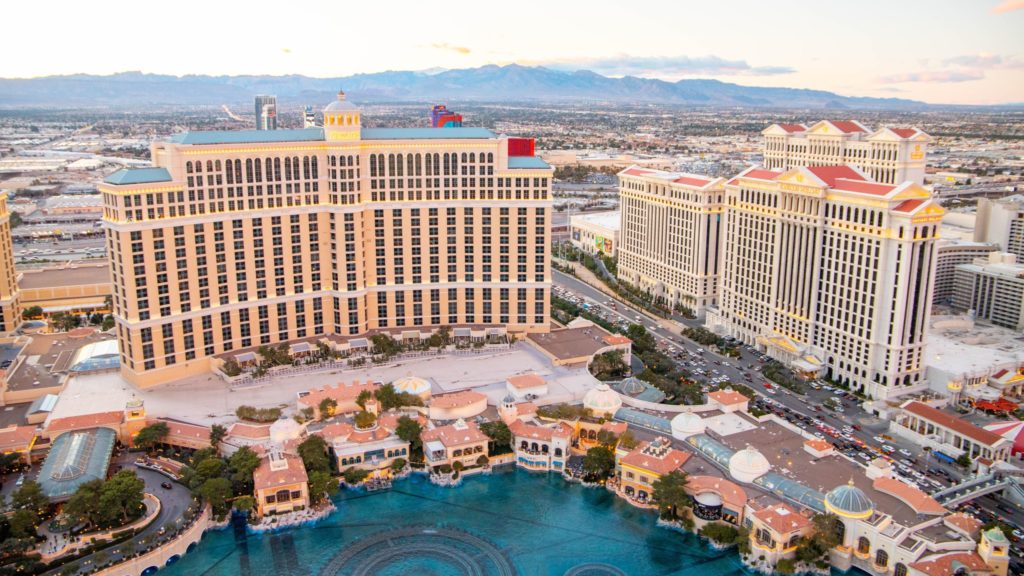 a large building next to a river