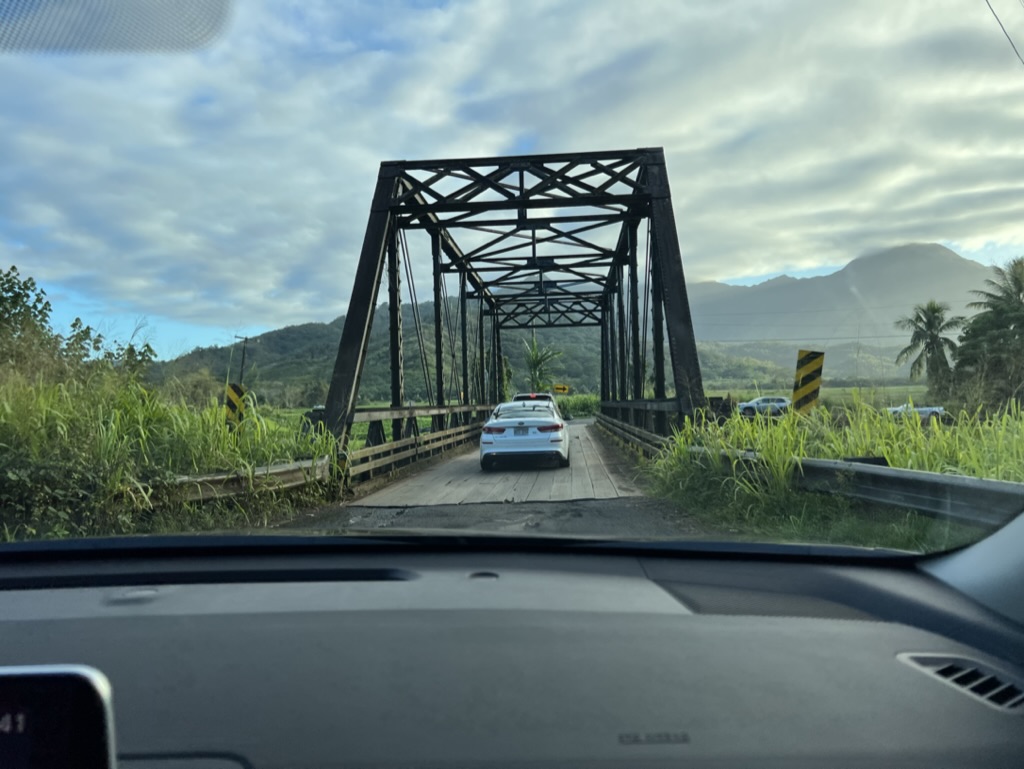 a car driving on a bridge