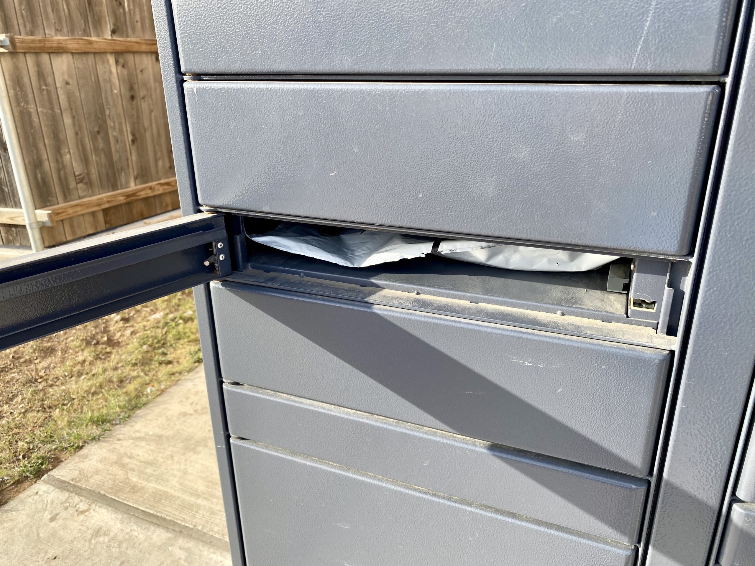 a mailbox with a mail slot
