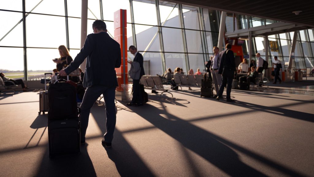 people walking in an airport