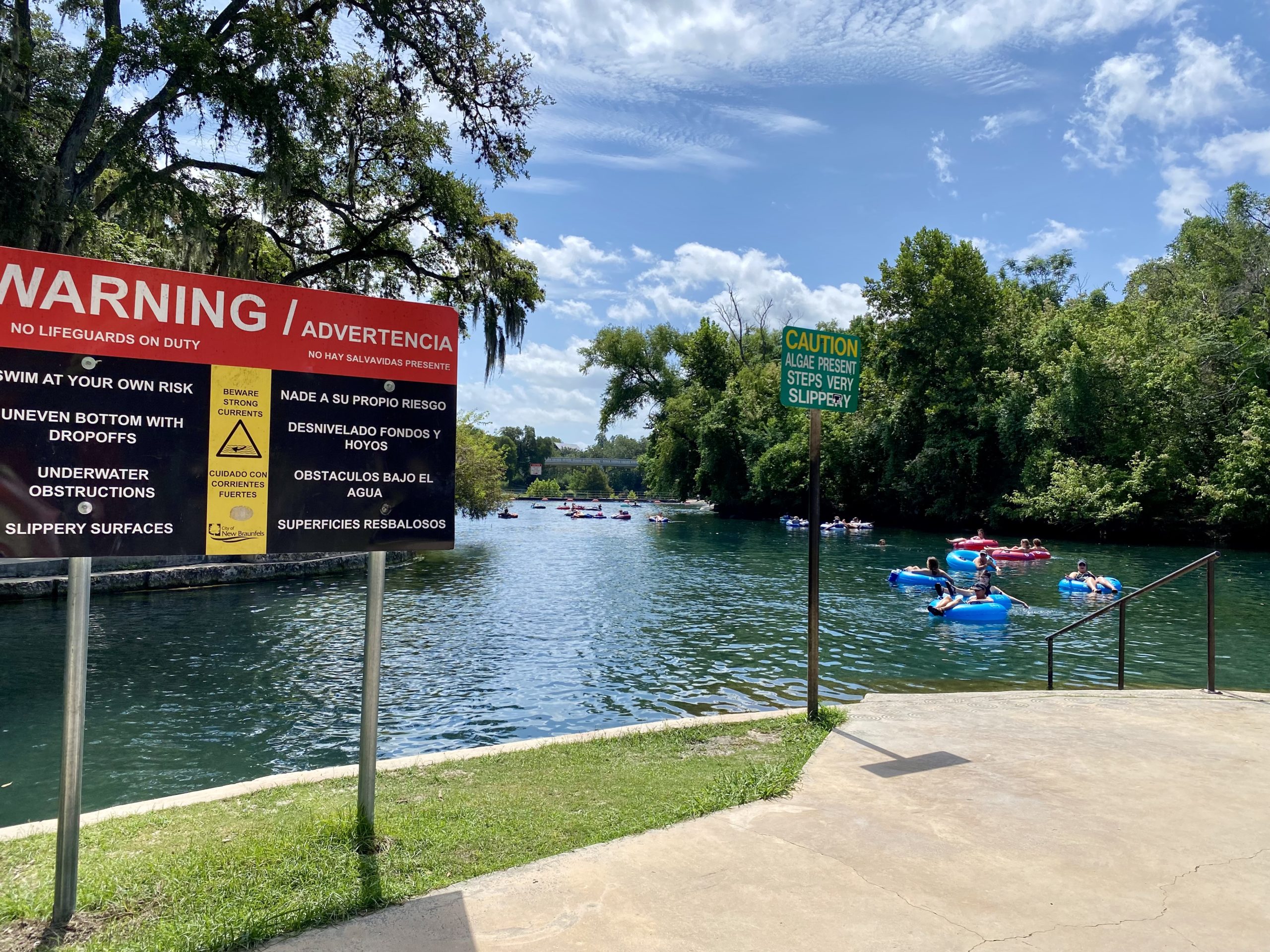 a sign on a body of water