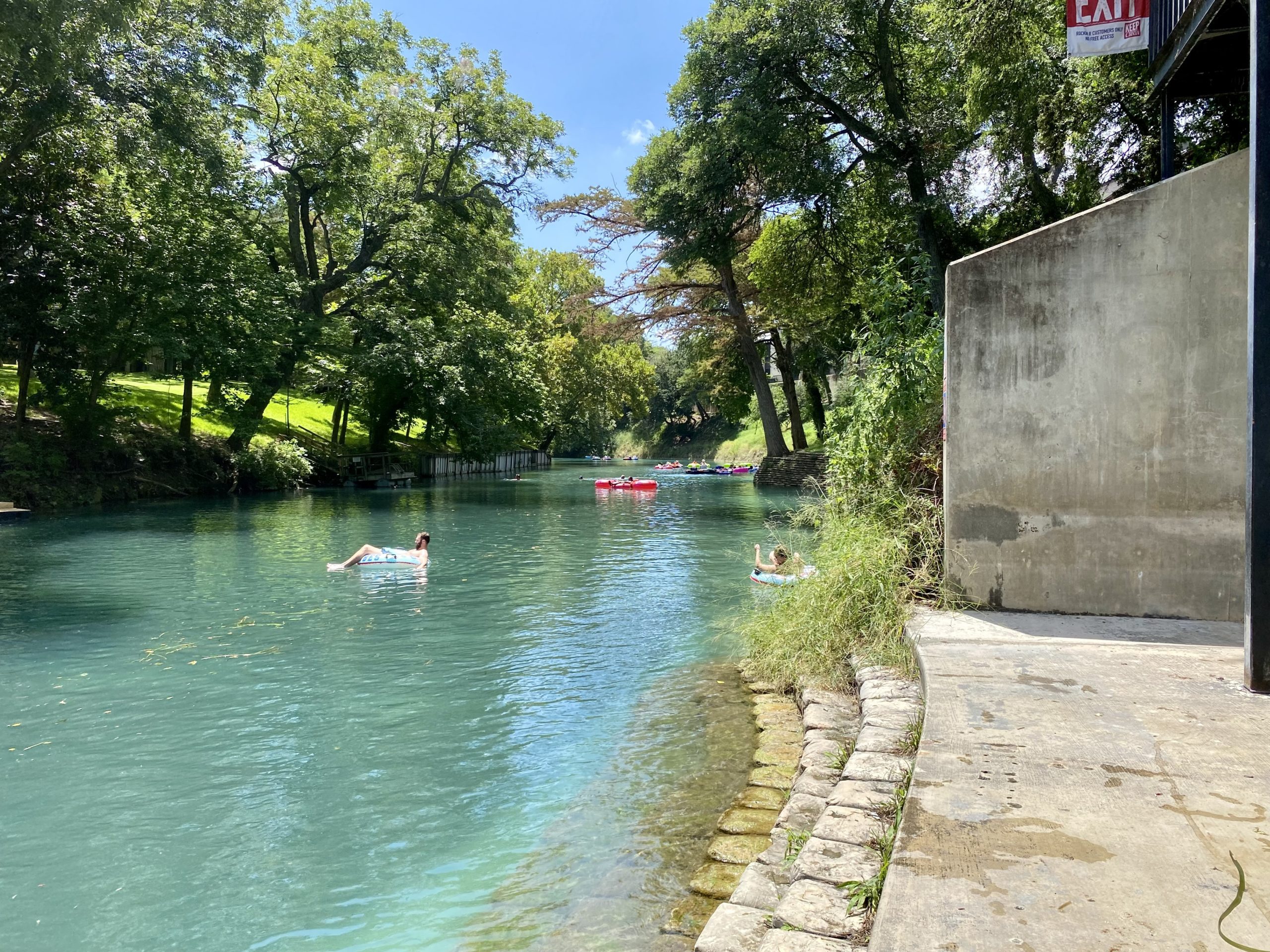 people swimming in a river