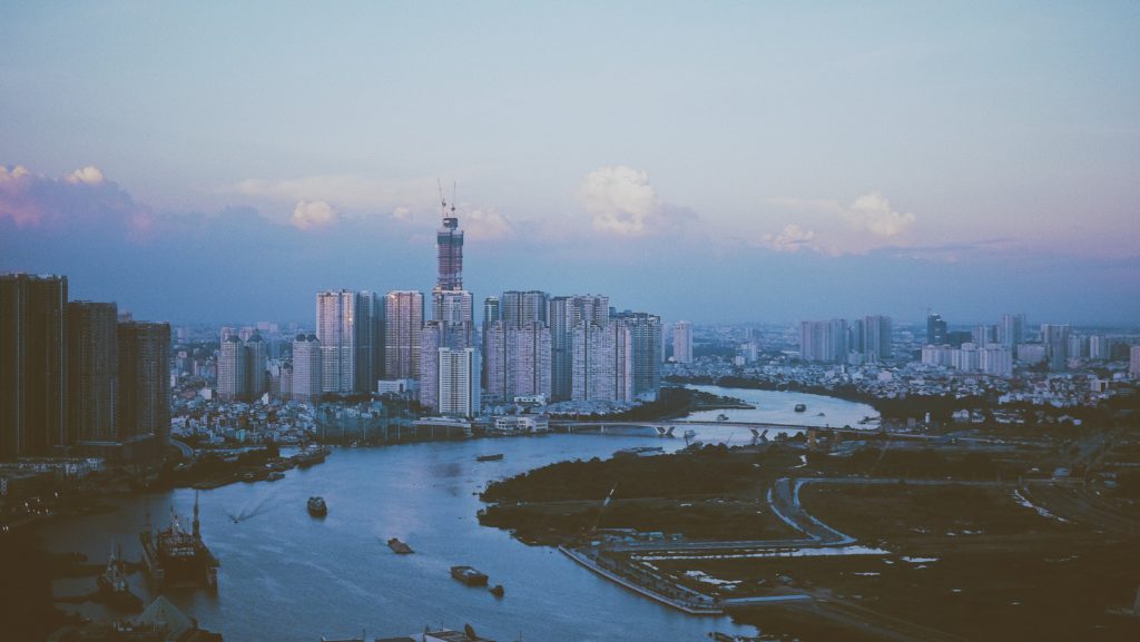 a river with a city in the background